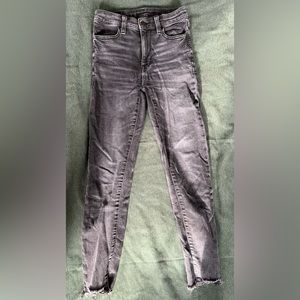 American Eagle super stretch black jeans frayed ankle size 0